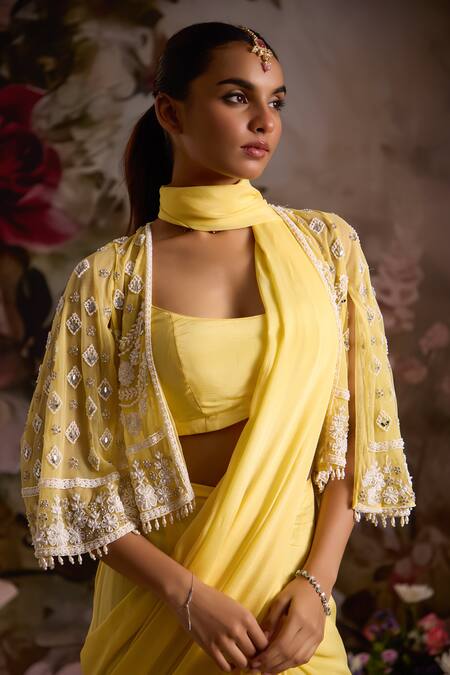 Saniya Sharma_Yellow Chiffon, Net Scoop Neck Pre-draped Saree Set With Bead Embellished Cape _at_Aza_Fashions