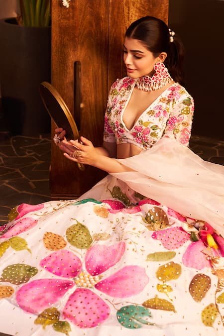 Shop Swish By Dolcy And Simran Ivory Chanderi, Linen Sequins, Beads Plunge Naina Handpainted Floral Lehenga Set at Aza Fashions Shop_Swish By Dolcy And Simran_Ivory Chanderi, Linen Sequins, Beads Plunge Naina Handpainted Floral Lehenga Set _at_Aza_Fashions