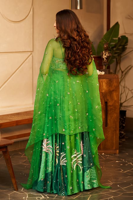 Shop Swish By Dolcy And Simran Green Chanderi Sequins, Cut Work, Laila Palm Tree Embroidered Cape And Pant Set at Aza Fashions Shop_Swish By Dolcy And Simran_Green Chanderi Sequins, Cut Work, Laila Palm Tree Embroidered Cape And Pant Set _at_Aza_Fashions