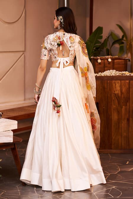 Shop Swish By Dolcy And Simran Ivory Chanderi Sequins, Tassels, Shehnaaz Floral Cutdana Embroidered Lehenga Set at Aza Fashions Shop_Swish By Dolcy And Simran_Ivory Chanderi Sequins, Tassels, Shehnaaz Floral Cutdana Embroidered Lehenga Set _at_Aza_Fashions