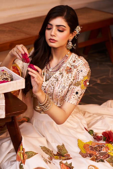 Shop Swish By Dolcy And Simran Ivory Chanderi Sequins, Tassels, Shehnaaz Floral Cutdana Embroidered Lehenga Set Online at Aza Fashions Shop_Swish By Dolcy And Simran_Ivory Chanderi Sequins, Tassels, Shehnaaz Floral Cutdana Embroidered Lehenga Set _Online_at_Aza_Fashions