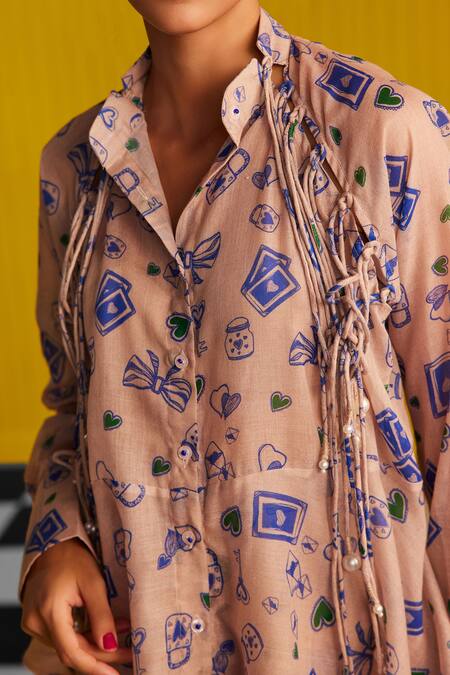 ZiP by Payal & Zinal Ivory Cotton, Polyester Pearls Collared Heart Strings Chic Print Shirt Online at Aza Fashions ZiP by Payal & Zinal_Ivory Cotton, Polyester Pearls Collared Heart Strings Chic Print Shirt_Online_at_Aza_Fashions