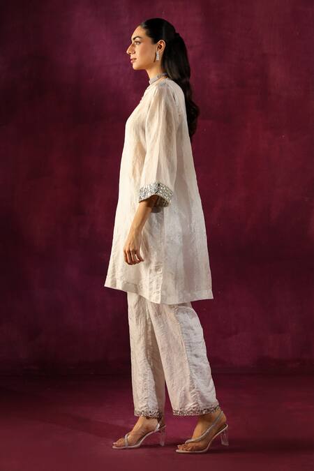 Twenty Nine White Chanderi Mirrors Split V-neck Sleeve Embellished Tunic And Pant Set Online at Aza Fashions Twenty Nine_White Chanderi Mirrors Split V-neck Sleeve Embellished Tunic And Pant Set _Online_at_Aza_Fashions