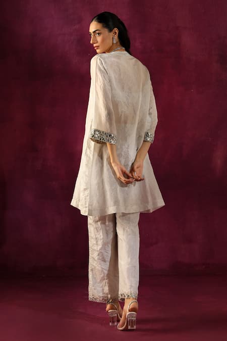 Shop Twenty Nine White Chanderi Mirrors Split V-neck Sleeve Embellished Tunic And Pant Set at Aza Fashions Shop_Twenty Nine_White Chanderi Mirrors Split V-neck Sleeve Embellished Tunic And Pant Set _at_Aza_Fashions