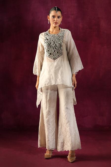 Twenty Nine White Tissue Mirrors Round Neck Yoke Embellished Tunic And Flared Pant Set Online at Aza Fashions Twenty Nine_White Tissue Mirrors Round Neck Yoke Embellished Tunic And Flared Pant Set _Online_at_Aza_Fashions