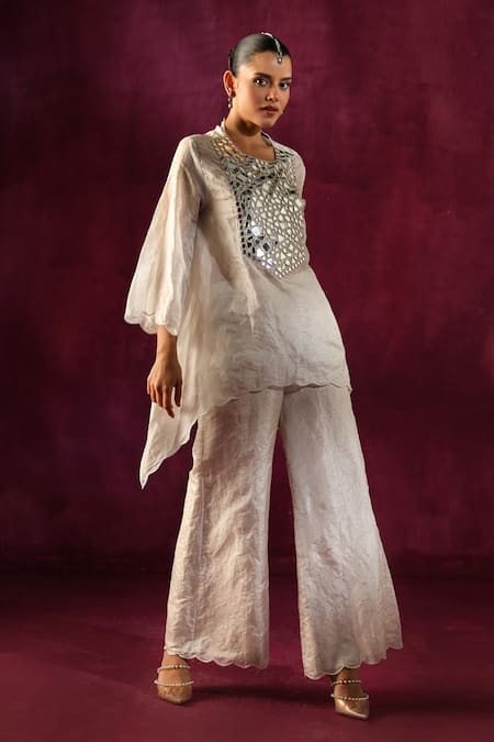 Buy Twenty Nine White Tissue Mirrors Round Neck Yoke Embellished Tunic And Flared Pant Set Online at Aza Fashions Buy_Twenty Nine_White Tissue Mirrors Round Neck Yoke Embellished Tunic And Flared Pant Set _Online_at_Aza_Fashions