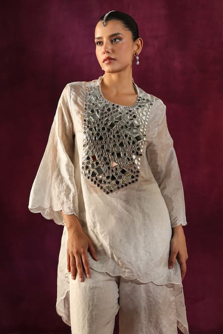 Shop Twenty Nine White Tissue Mirrors Round Neck Yoke Embellished Tunic And Flared Pant Set Online at Aza Fashions Shop_Twenty Nine_White Tissue Mirrors Round Neck Yoke Embellished Tunic And Flared Pant Set _Online_at_Aza_Fashions