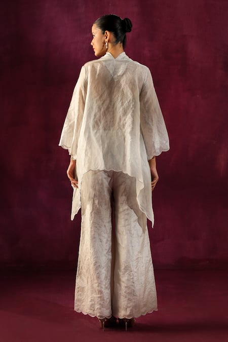 Shop Twenty Nine White Tissue Mirrors Round Neck Yoke Embellished Tunic And Flared Pant Set at Aza Fashions Shop_Twenty Nine_White Tissue Mirrors Round Neck Yoke Embellished Tunic And Flared Pant Set _at_Aza_Fashions