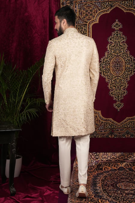 Shop Sven Suits Beige Silk Embroidery, Zari Floral Bloom Sherwani And Pant Set at Aza Fashions Shop_Sven Suits_Beige Silk Embroidery, Zari Floral Bloom Sherwani And Pant Set _at_Aza_Fashions