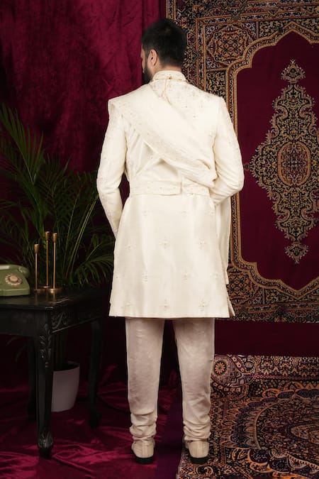 Shop Sven Suits Ivory Silk Pearls, Sequins, Beads, Embroidery Floral Butti Sherwani Set at Aza Fashions Shop_Sven Suits_Ivory Silk Pearls, Sequins, Beads, Embroidery Floral Butti Sherwani Set _at_Aza_Fashions