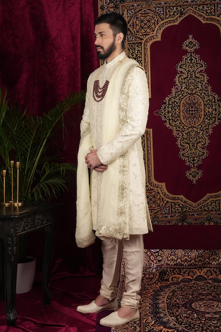 Sven Suits_Ivory Silk Beads, Stones, Zari Floral Vine Embroidered Sherwani Set _at_Aza_Fashions