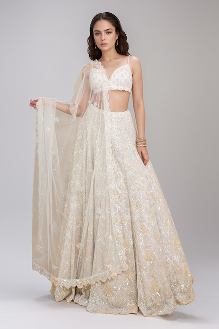 Seema Gujral_Ivory Net Sequins, Embroidery Sweetheart Neck Embellished Bridal Lehenga Set _Online_at_Aza_Fashions