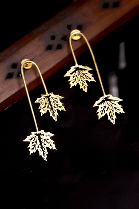 Shop Dugran By Dugristyle Gold Plated Rangin Leaf Curved Earrings at Aza Fashions Shop_Dugran By Dugristyle_Gold Plated Rangin Leaf Curved Earrings _at_Aza_Fashions