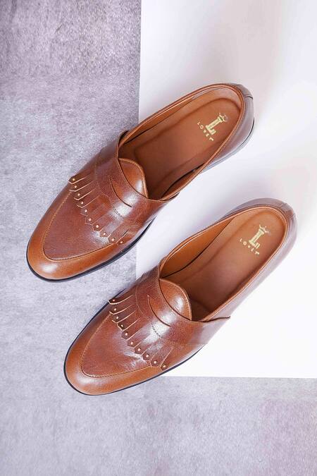 Lovey Brown Tan Leather Fringed Slip On Shoes Online at Aza Fashions Lovey_Brown Tan Leather Fringed Slip On Shoes _Online_at_Aza_Fashions