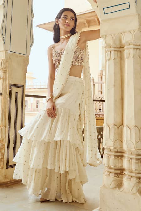 Nikita Vishakha Ivory Organza, Satin Sequins, Tassels, Embroidery Tiered Saree With Blouse Online at Aza Fashions Nikita Vishakha_Ivory Organza, Satin Sequins, Tassels, Embroidery Tiered Saree With Blouse _Online_at_Aza_Fashions