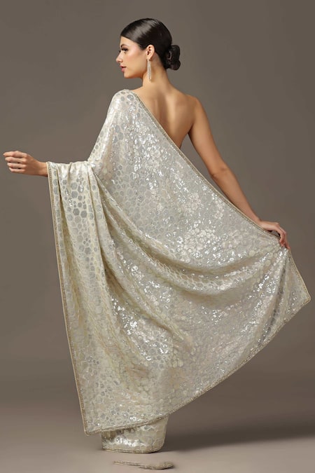 Shop Two Sisters By Gyans Beige Georgette Sequins, Cut Embellished Saree With Unstitched Blouse Piece at Aza Fashions Shop_Two Sisters By Gyans_Beige Georgette Sequins, Cut Embellished Saree With Unstitched Blouse Piece _at_Aza_Fashions