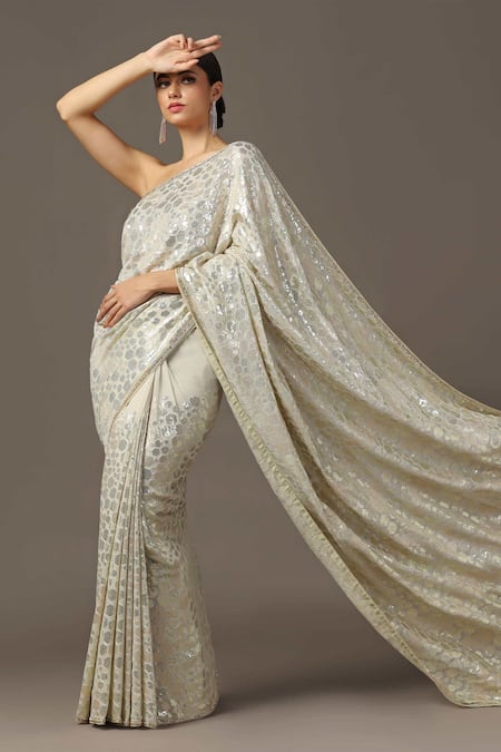 Two Sisters By Gyans Beige Georgette Sequins, Cut Embellished Saree With Unstitched Blouse Piece Online at Aza Fashions Two Sisters By Gyans_Beige Georgette Sequins, Cut Embellished Saree With Unstitched Blouse Piece _Online_at_Aza_Fashions