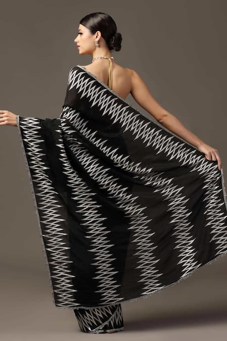 Shop Two Sisters By Gyans Black Georgette Crystals, Sequins Embellished Saree With Unstitched Blouse Piece at Aza Fashions Shop_Two Sisters By Gyans_Black Georgette Crystals, Sequins Embellished Saree With Unstitched Blouse Piece _at_Aza_Fashions