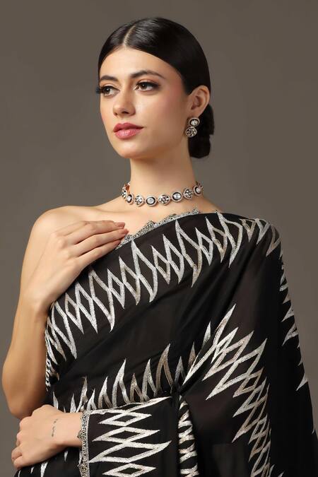 Two Sisters By Gyans Black Georgette Crystals, Sequins Embellished Saree With Unstitched Blouse Piece Online at Aza Fashions Two Sisters By Gyans_Black Georgette Crystals, Sequins Embellished Saree With Unstitched Blouse Piece _Online_at_Aza_Fashions