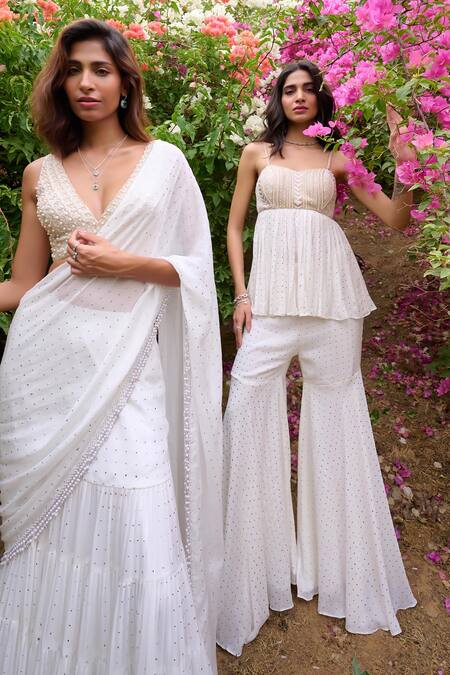 Buy Chamee And Palak Ivory Georgette, Net, Silk, Tulle Pearls, Nyra Embroidered Peplum Sharara Set Online at Aza Fashions Buy_Chamee And Palak_Ivory Georgette, Net, Silk, Tulle Pearls, Nyra Embroidered Peplum Sharara Set _Online_at_Aza_Fashions