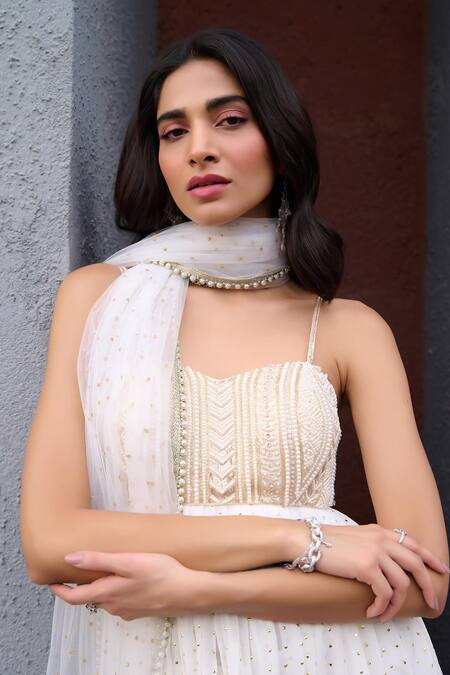 Shop Chamee And Palak Ivory Georgette, Net, Silk, Tulle Pearls, Nyra Embroidered Peplum Sharara Set Shop_Chamee And Palak_Ivory Georgette, Net, Silk, Tulle Pearls, Nyra Embroidered Peplum Sharara Set