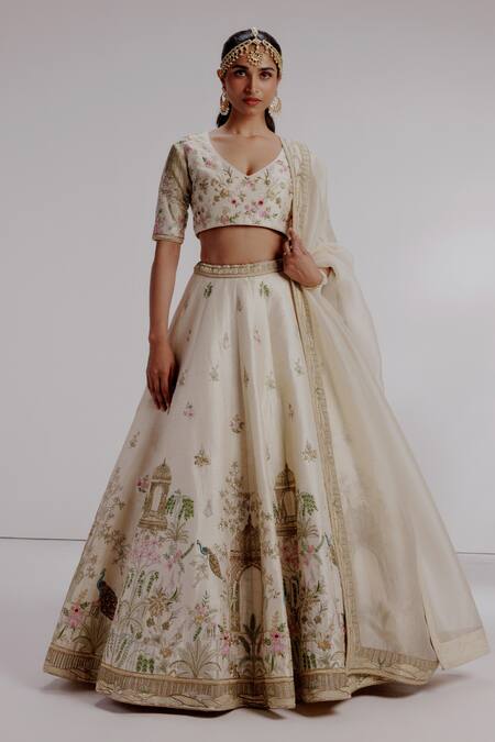Buy Taisha Ivory , Organza Tassels, Embroidery, Bahaar Mughal Garden Lehenga Set Online at Aza Fashions Buy_Taisha_Ivory , Organza Tassels, Embroidery, Bahaar Mughal Garden Lehenga Set _Online_at_Aza_Fashions