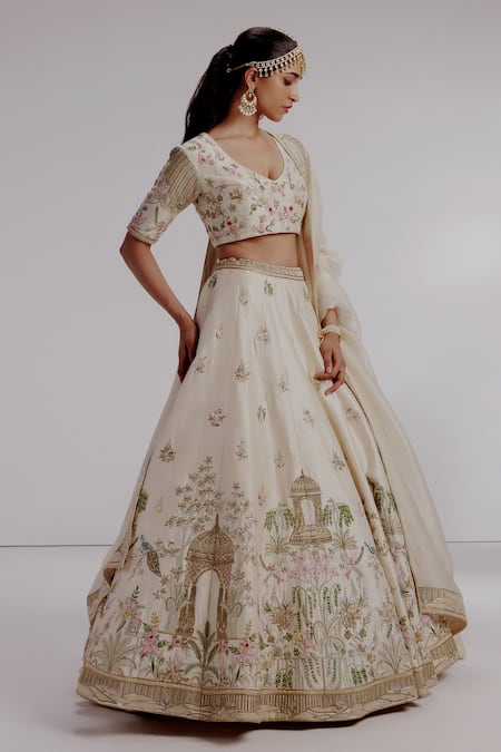 Shop Taisha Ivory , Organza Tassels, Embroidery, Bahaar Mughal Garden Lehenga Set Online at Aza Fashions Shop_Taisha_Ivory , Organza Tassels, Embroidery, Bahaar Mughal Garden Lehenga Set _Online_at_Aza_Fashions