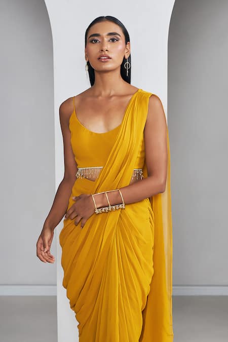 Shop_Ankita Bajaj Label_Yellow Georgette Crystals Scoop Neck Saffron Glow Pre-draped Saree With Blouse _Online_at_Aza_Fashions