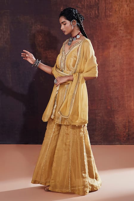 Shop Affroz Gold Tissue, Silk Lace, Sequins, Embroidery Plunge Neck A-line Kurta Sharara Set Online at Aza Fashions Shop_Affroz_Gold Tissue, Silk Lace, Sequins, Embroidery Plunge Neck A-line Kurta Sharara Set _Online_at_Aza_Fashions