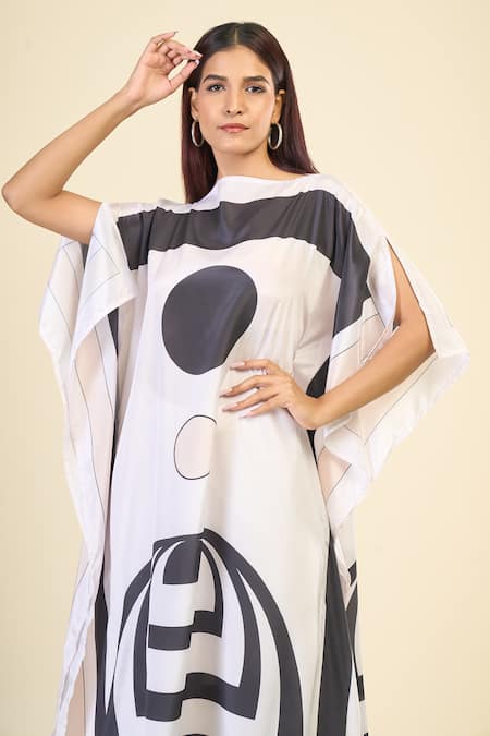 Naintara Bajaj_Black Silk, Crepe Boat Neck Soft Cosmos Print Kaftan _at_Aza_Fashions