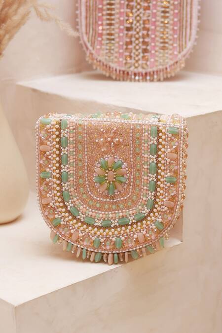 The Tan Clan Peach Cut Work, Beads, Stones Amulya Cutdana Embellished Bag Online at Aza Fashions The Tan Clan_Peach Cut Work, Beads, Stones Amulya Cutdana Embellished Bag _Online_at_Aza_Fashions