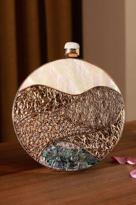 Shop The Tan Clan Gold Mother Of Pearl Crescent Embellished Clutch at Aza Fashions Shop_The Tan Clan_Gold Mother Of Pearl Crescent Embellished Clutch _at_Aza_Fashions