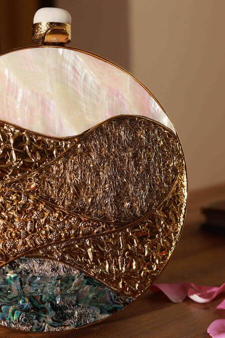 Shop The Tan Clan Gold Mother Of Pearl Crescent Embellished Clutch Online at Aza Fashions Shop_The Tan Clan_Gold Mother Of Pearl Crescent Embellished Clutch _Online_at_Aza_Fashions