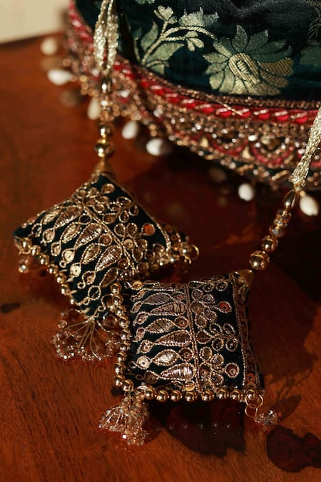 Shop_The Tan Clan_Green Sequins, Zari, Metallic Thread Kashvi Floral Woven Potli _Online_at_Aza_Fashions