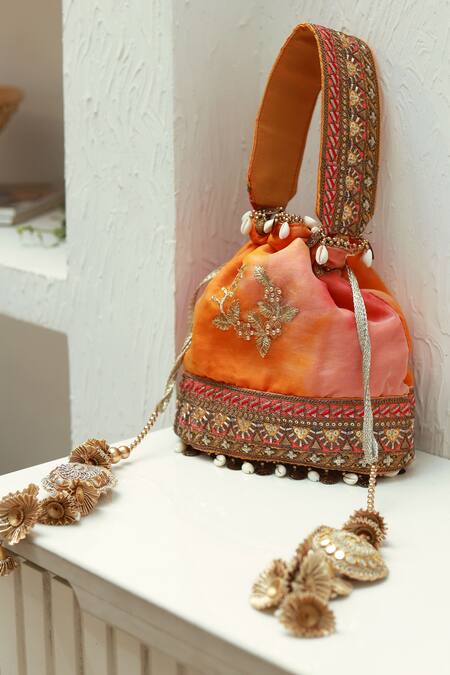 Shop The Tan Clan Yellow Sequins, Metallic Thread, Zari Kashvi Flower Woven Potli at Aza Fashions Shop_The Tan Clan_Yellow Sequins, Metallic Thread, Zari Kashvi Flower Woven Potli_at_Aza_Fashions