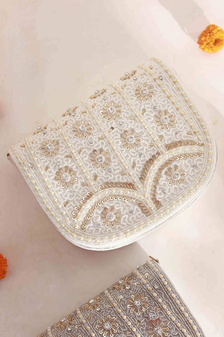 Shop The Tan Clan White Beads Kavya Studded Clutch at Aza Fashions Shop_The Tan Clan_White Beads Kavya Studded Clutch _at_Aza_Fashions