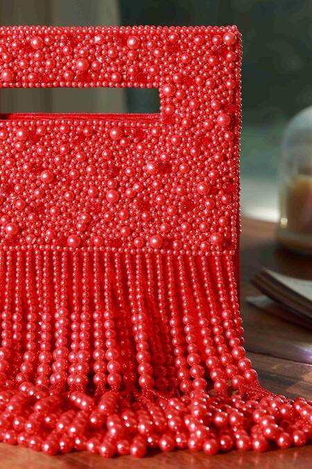The Tan Clan Red Bead Ruby Embellished Flap Over Clutch Bag Online at Aza Fashions The Tan Clan_Red Bead Ruby Embellished Flap Over Clutch Bag _Online_at_Aza_Fashions