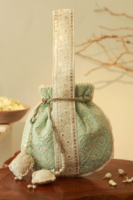 Shop The Tan Clan Blue Thread Ruhi And Sequin Potli Bag at Aza Fashions Shop_The Tan Clan_Blue Thread Ruhi And Sequin Potli Bag _at_Aza_Fashions