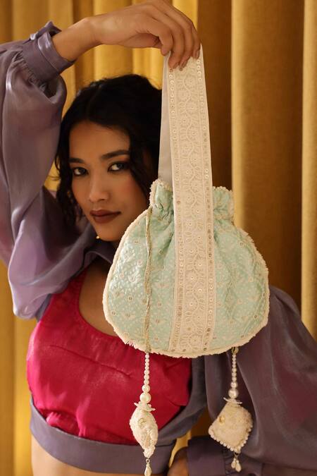 Buy The Tan Clan Blue Thread Ruhi And Sequin Potli Bag Online at Aza Fashions Buy_The Tan Clan_Blue Thread Ruhi And Sequin Potli Bag _Online_at_Aza_Fashions