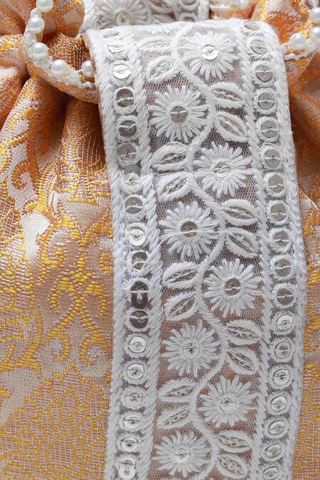 Shop The Tan Clan Yellow Thread Ruhi Embroidered Potli Bag Online at Aza Fashions Shop_The Tan Clan_Yellow Thread Ruhi Embroidered Potli Bag _Online_at_Aza_Fashions