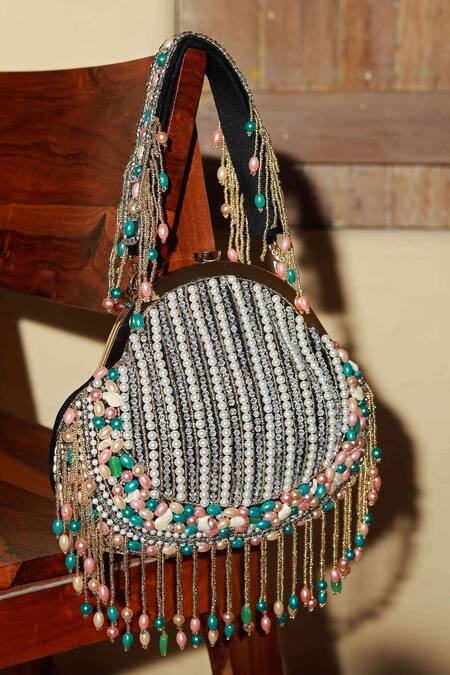 The Tan Clan Black Pearl Sona And Tasseled Batua Bag at Aza Fashions The Tan Clan_Black Pearl Sona And Tasseled Batua Bag _at_Aza_Fashions