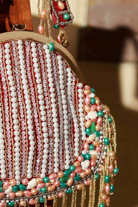 The Tan Clan Red Pearls, Tassels Sona And Work Batua Bag Online at Aza Fashions The Tan Clan_Red Pearls, Tassels Sona And Work Batua Bag _Online_at_Aza_Fashions