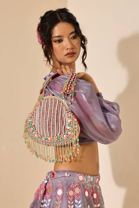 The Tan Clan Red Pearls, Tassels Sona And Work Batua Bag at Aza Fashions The Tan Clan_Red Pearls, Tassels Sona And Work Batua Bag _at_Aza_Fashions