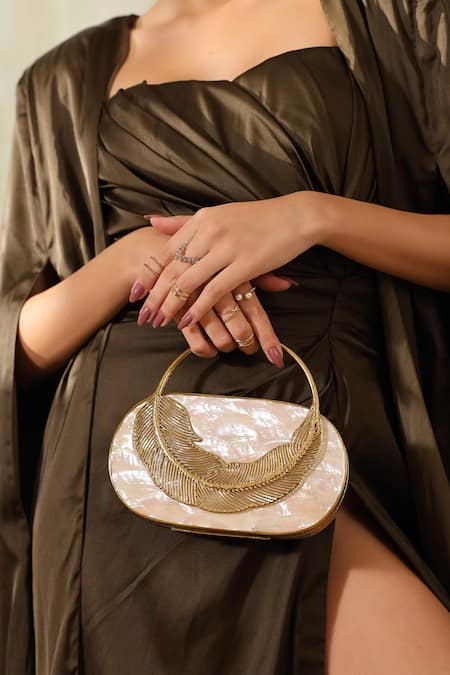The Tan Clan Gold Metallic Thread Stella Mother Of Pearl Clutch Bag at Aza Fashions The Tan Clan_Gold Metallic Thread Stella Mother Of Pearl Clutch Bag _at_Aza_Fashions