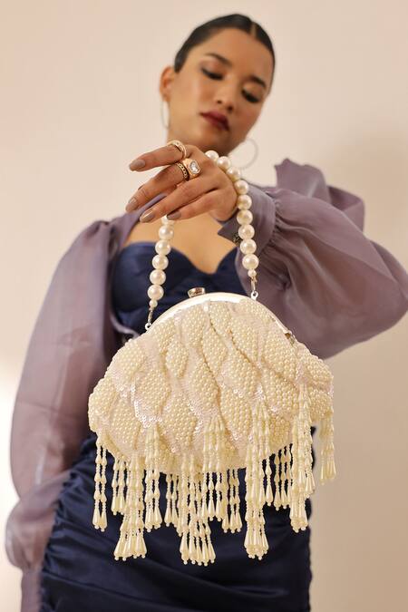The Tan Clan White Pearls, Tassels Tara And Bag Online at Aza Fashions The Tan Clan_White Pearls, Tassels Tara And Bag _Online_at_Aza_Fashions