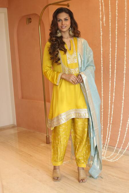 Shop_Izzumi Mehta_Yellow Modal, Chanderi Lace, Tassels, Zardosi Asymmetric Kurta And Pant Set _Online_at_Aza_Fashions