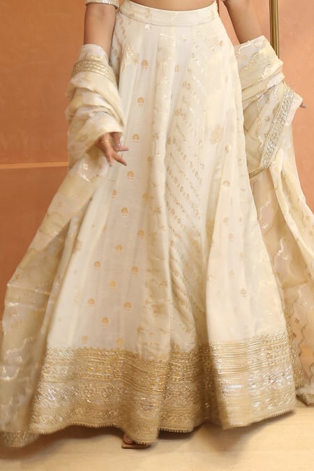 Shop_Izzumi Mehta_Ivory Chanderi Cut Work, Lace, Zari Floral Zardosi Embroidered Lehenga Set _Online_at_Aza_Fashions