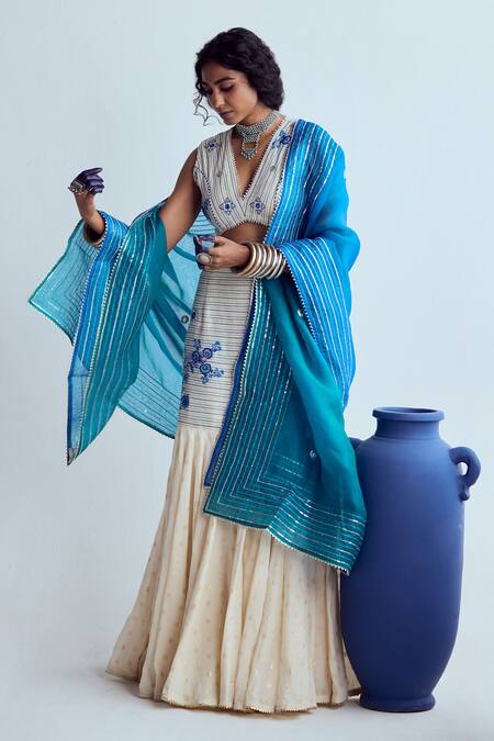 Shop Karishma Khanduja Bareilly Cream Kota Doria Mirrors, Embroidery V-neck Floral Skirt Set Online at Aza Fashions Shop_Karishma Khanduja Bareilly_Cream Kota Doria Mirrors, Embroidery V-neck Floral Skirt Set _Online_at_Aza_Fashions