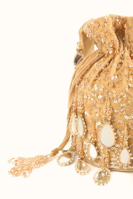 Shop House Of Kosha Gold Sequins, Mirrors, Tassels Sheesh Mahal Embellished Potli Bag at Aza Fashions Shop_House Of Kosha_Gold Sequins, Mirrors, Tassels Sheesh Mahal Embellished Potli Bag _at_Aza_Fashions
