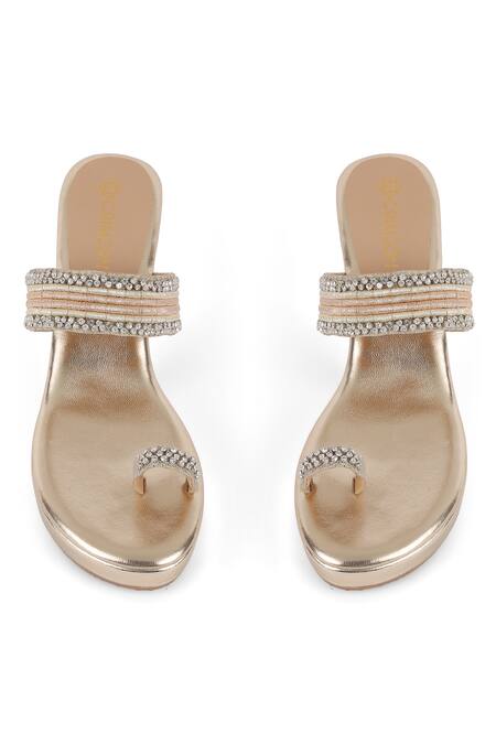 Shop CRIMZON Gold Crystals Suniya Stone Embellished Kolhapuri Wedges at Aza Fashions Shop_CRIMZON_Gold Crystals Suniya Stone Embellished Kolhapuri Wedges_at_Aza_Fashions